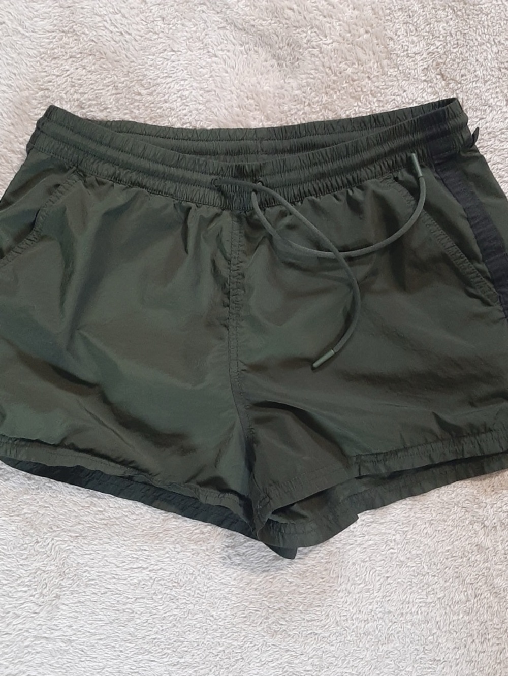 Athleta Expedition Shorts in a olive green